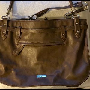 Gently used J.S. brown faux leather bag w/ tassels